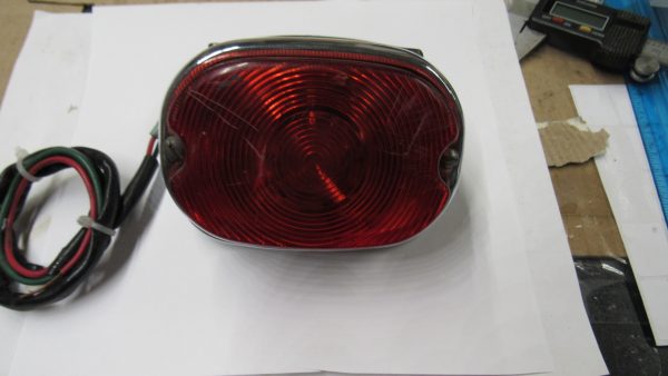 **USED**Harley Shovelhead Tail Lamp Assembly 1969-UP??  P/N 68010-64B